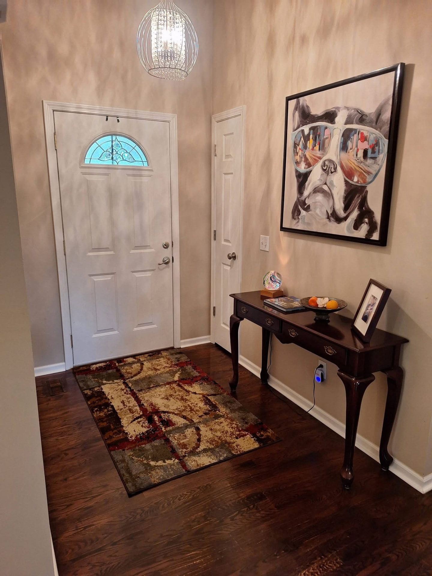 Clean entryway with polished wood floors